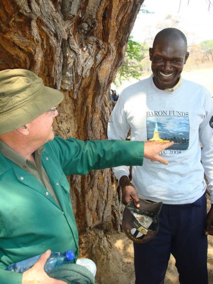 Man wearing Baron t-shirt in Zimbabwe. Activating element opens larger version of image.